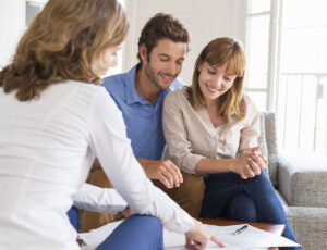 Couple signing mortgage loan